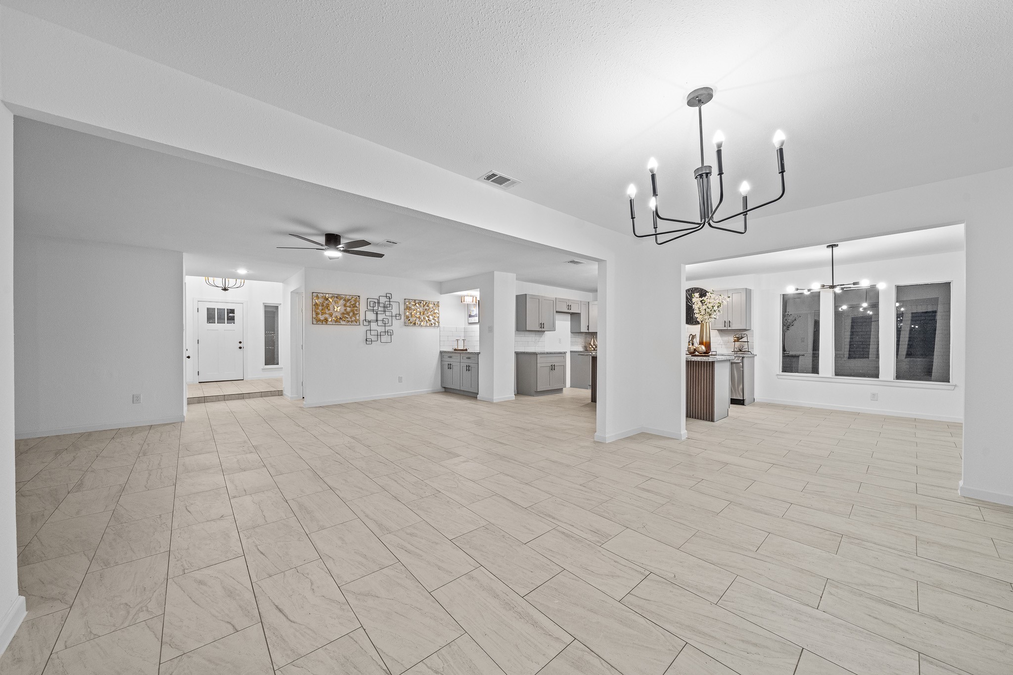 6706 Trigate Drive Houston, TX 77489 - Photo 5 of 40 a view of an empty room with chandelier