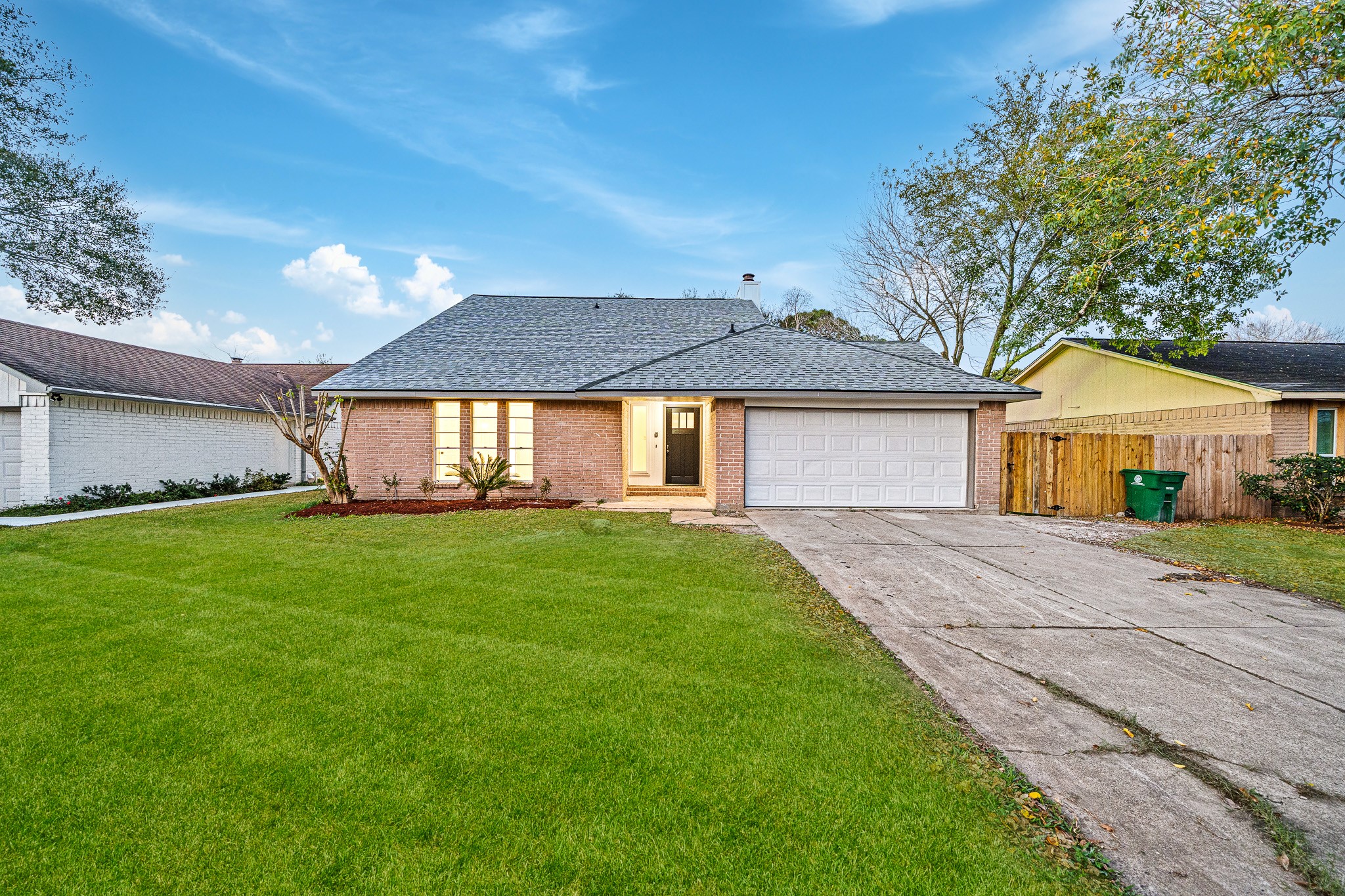 6706 Trigate Drive Houston, TX 77489 - Photo 6 of 40 a front view of a house with a garden