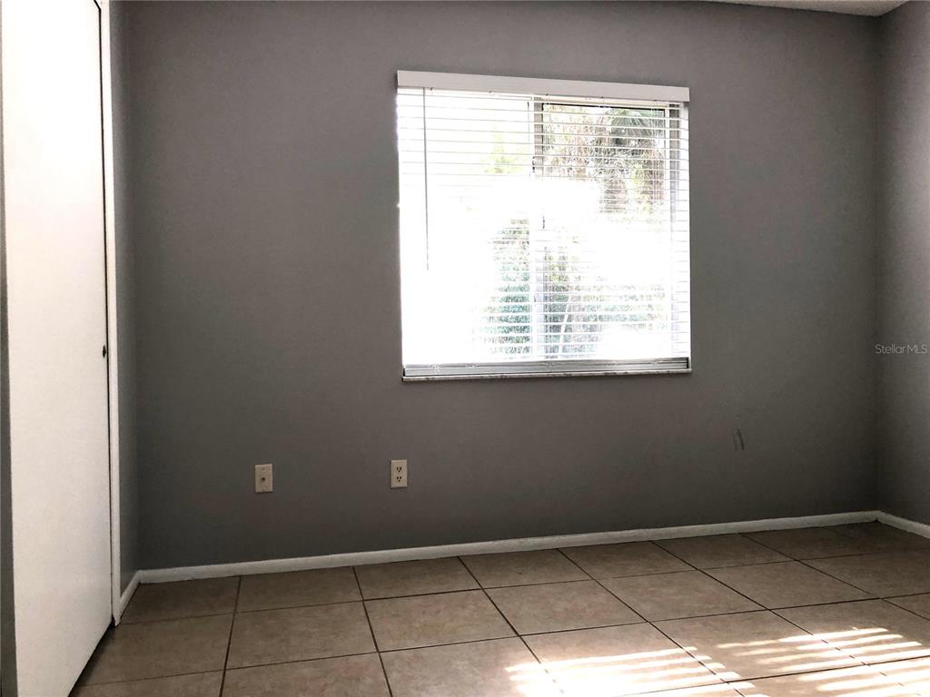 603 Alton Road Winter Springs, FL 32708 - Photo 7 of 8 a view of an empty room with a window