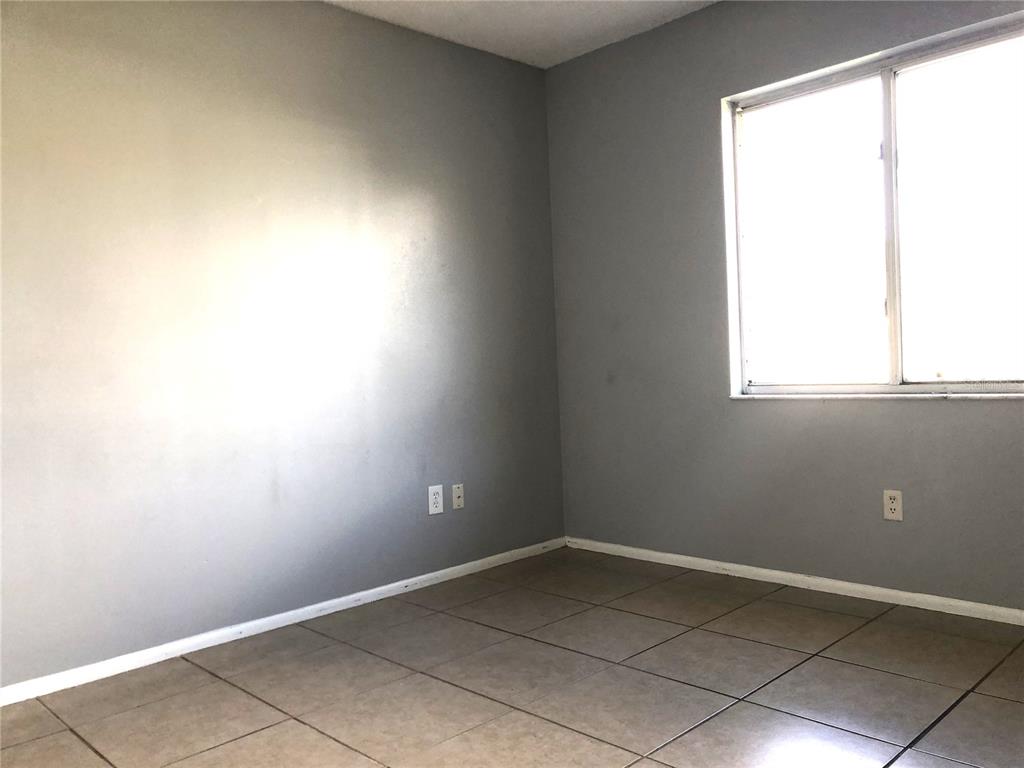 603 Alton Road Winter Springs, FL 32708 - Photo 8 of 8 an empty room with a window