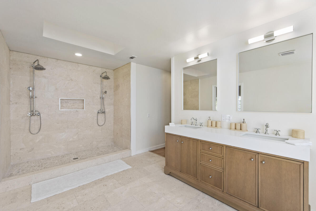 681 Daniel Drive Santa Maria, CA 93454 - Photo 11 of 26 a bathroom with a double vanity sink mirror double and shower