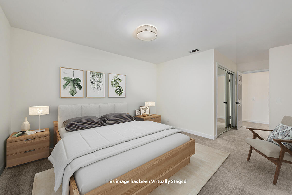 681 Daniel Drive Santa Maria, CA 93454 - Photo 17 of 26 a bedroom with a bed and a lamp