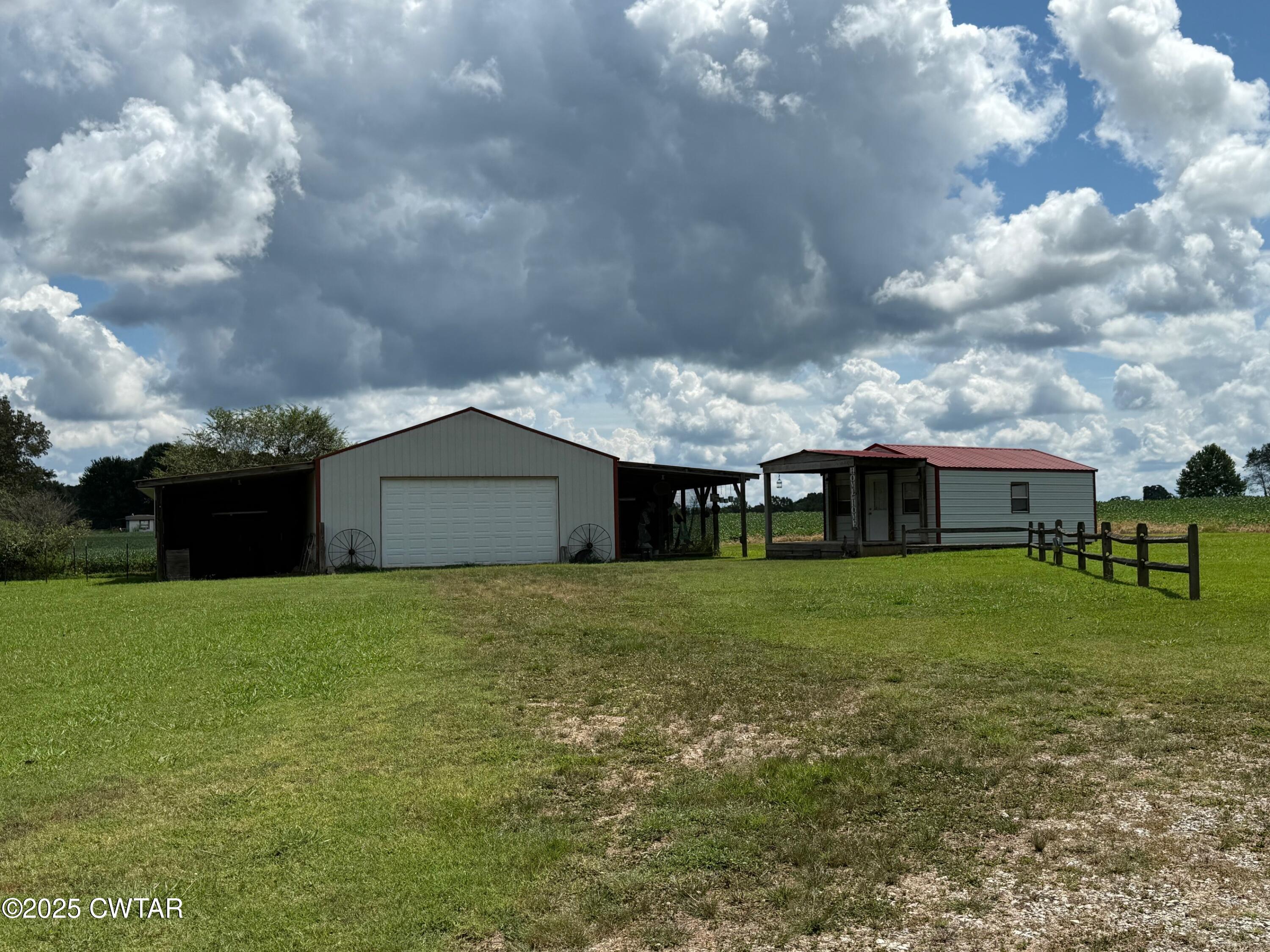 860 Plainview Road Henderson, TN 38340 - Photo 9 of 10 a house view with a garden space