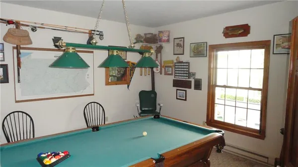 a room with window and furniture