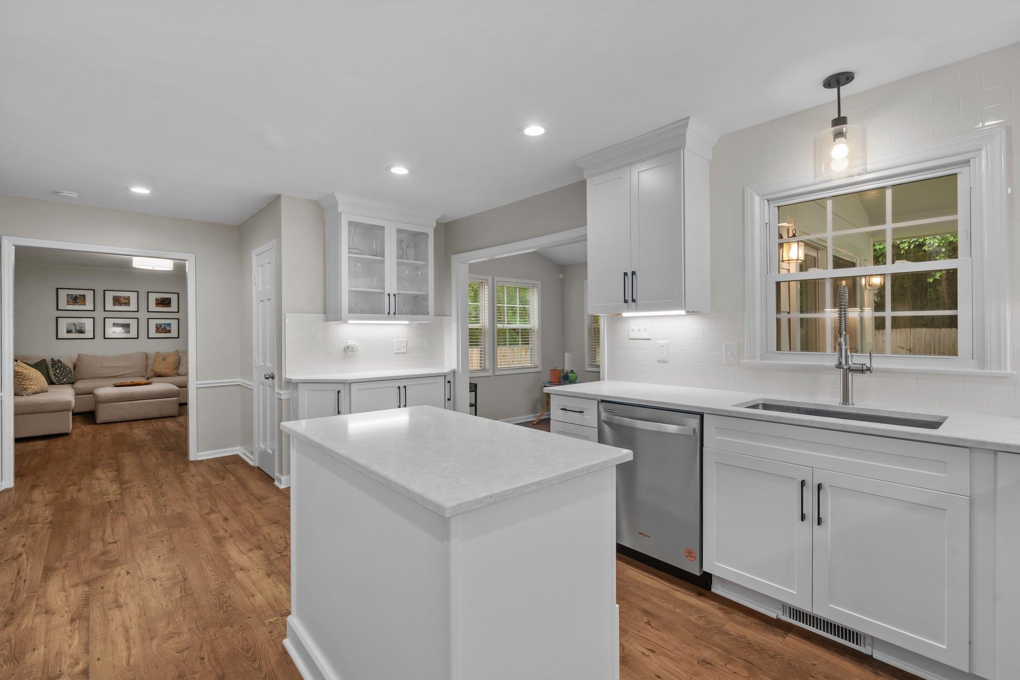 5209 Cedarwood Drive Raleigh, NC 27609 - Photo 10 of 33 a kitchen with a sink stove and cabinets