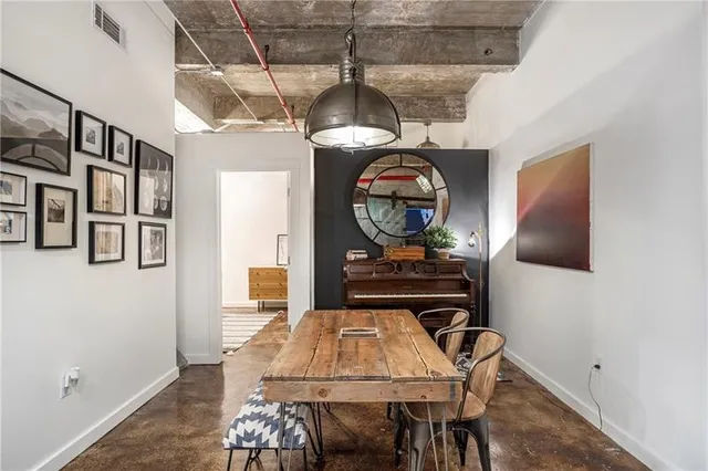 a room with furniture and wooden floor