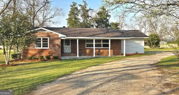 a view of a house with a patio