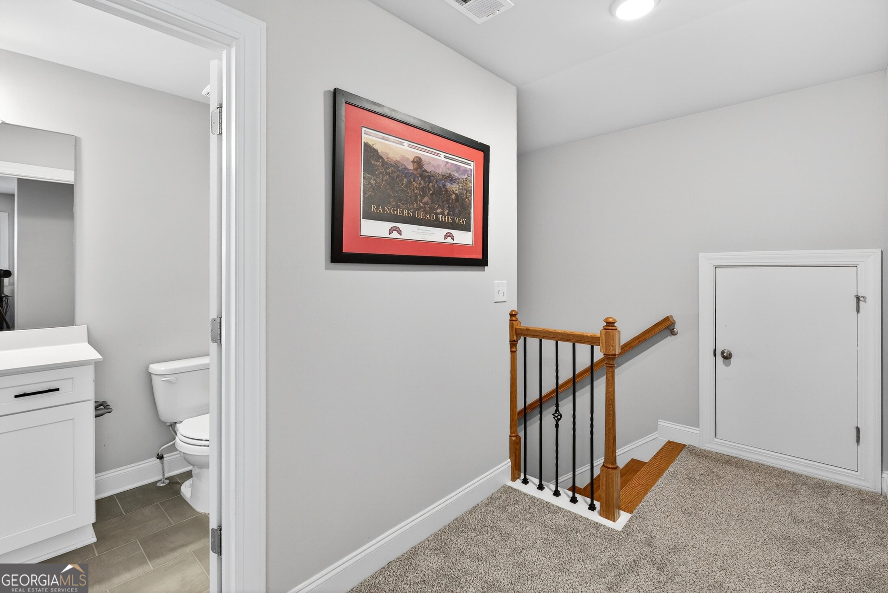 1764 Luther Bailey Road Senoia, GA 30276 - Photo 34 of 63 a view of a hallway with bathroom