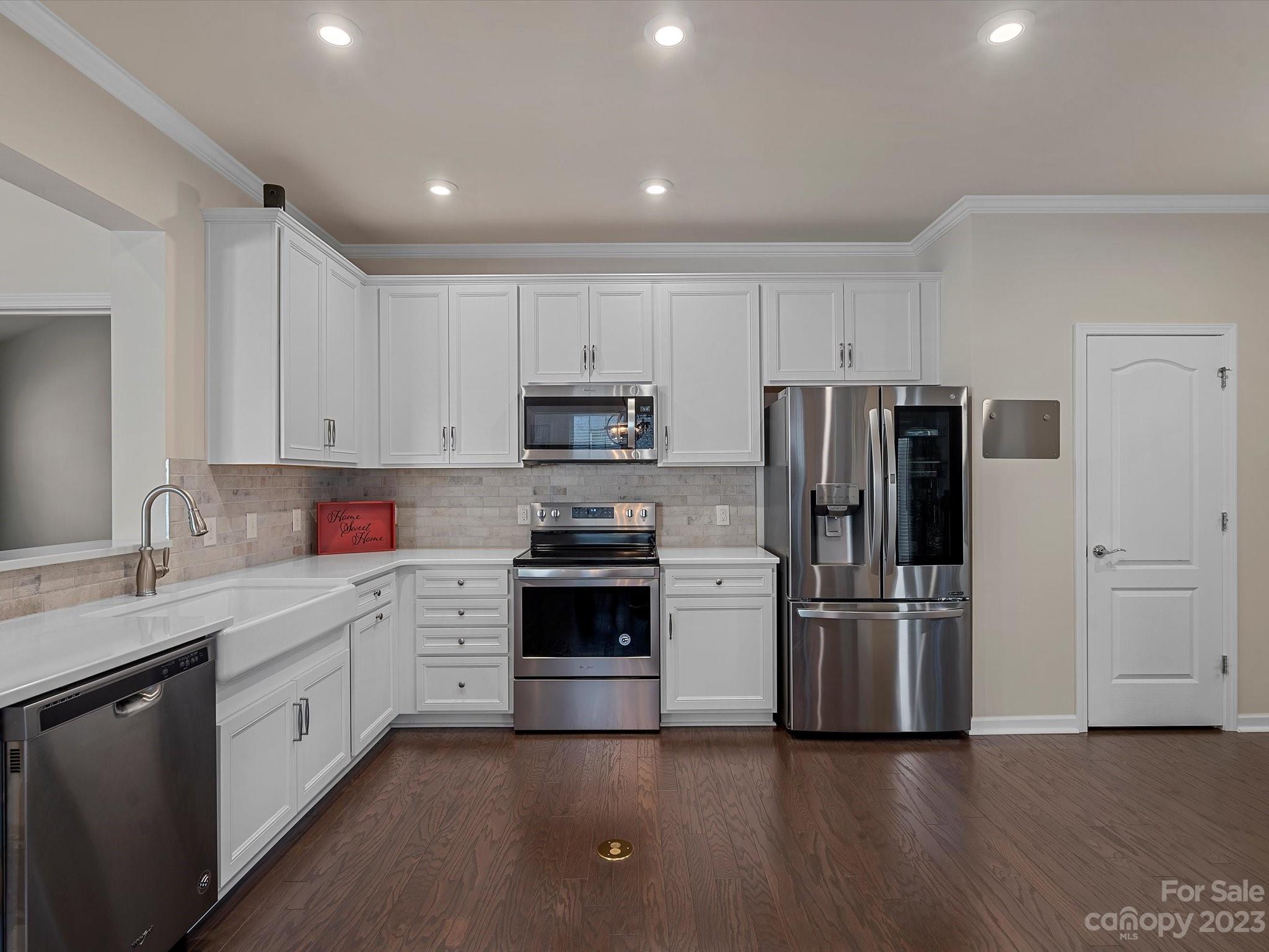 3071 Hartson Pointe Drive Indian Land, SC 29707 - Photo 11 of 48 a kitchen with cabinets stainless steel appliances and sink
