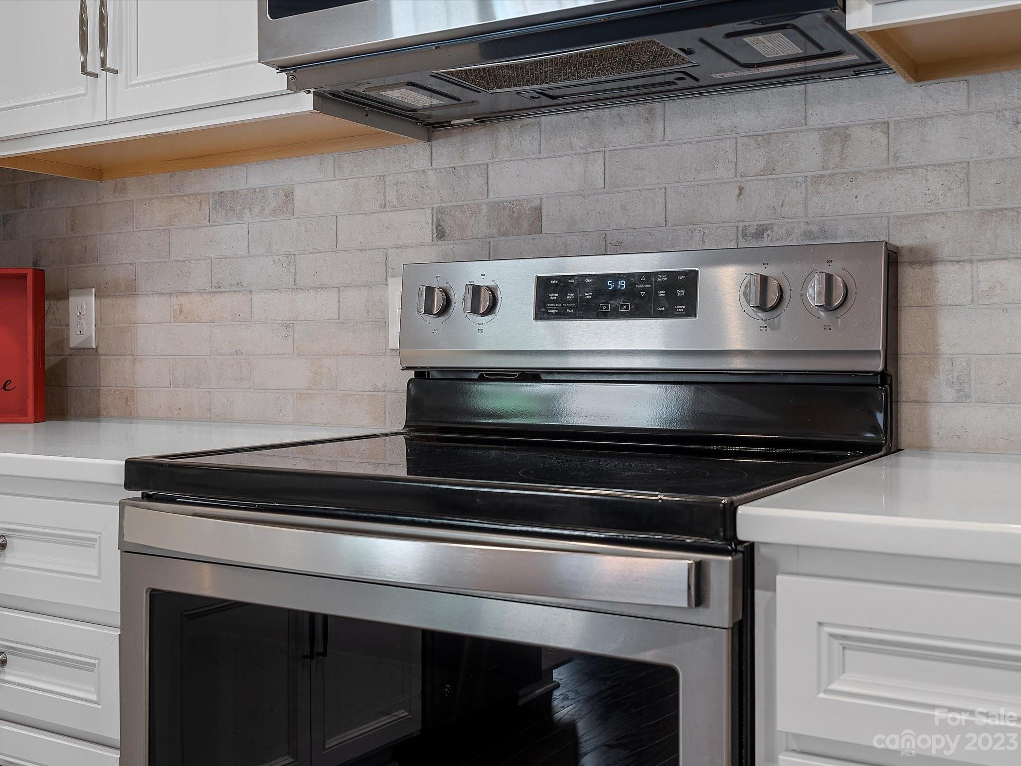 3071 Hartson Pointe Drive Indian Land, SC 29707 - Photo 12 of 48 a stove top oven sitting inside of a kitchen