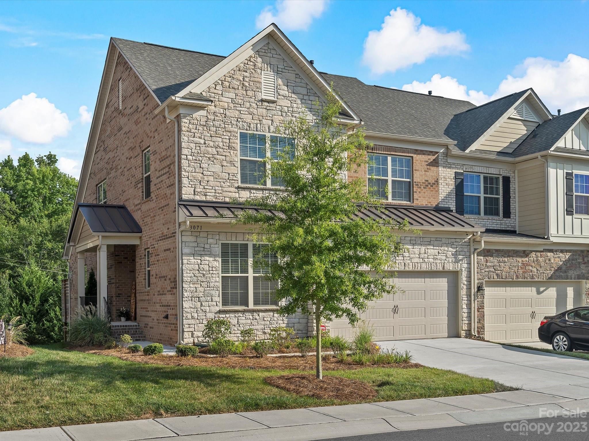 3071 Hartson Pointe Drive Indian Land, SC 29707 - Photo 2 of 48 a front view of a house