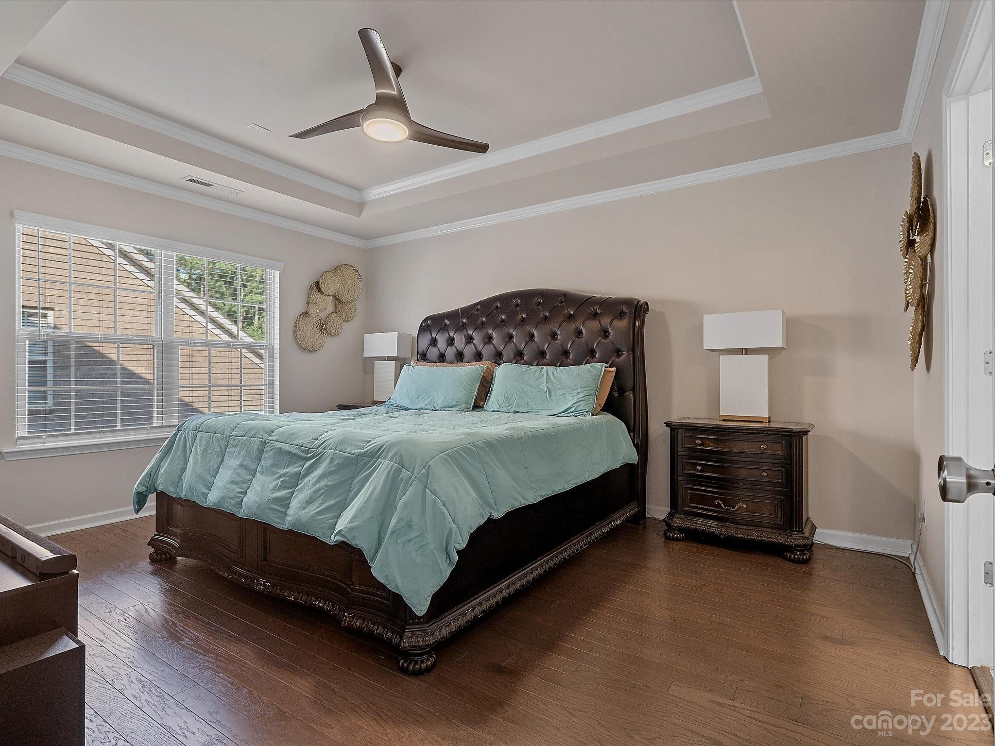 3071 Hartson Pointe Drive Indian Land, SC 29707 - Photo 23 of 48 a bedroom with a bed and a window