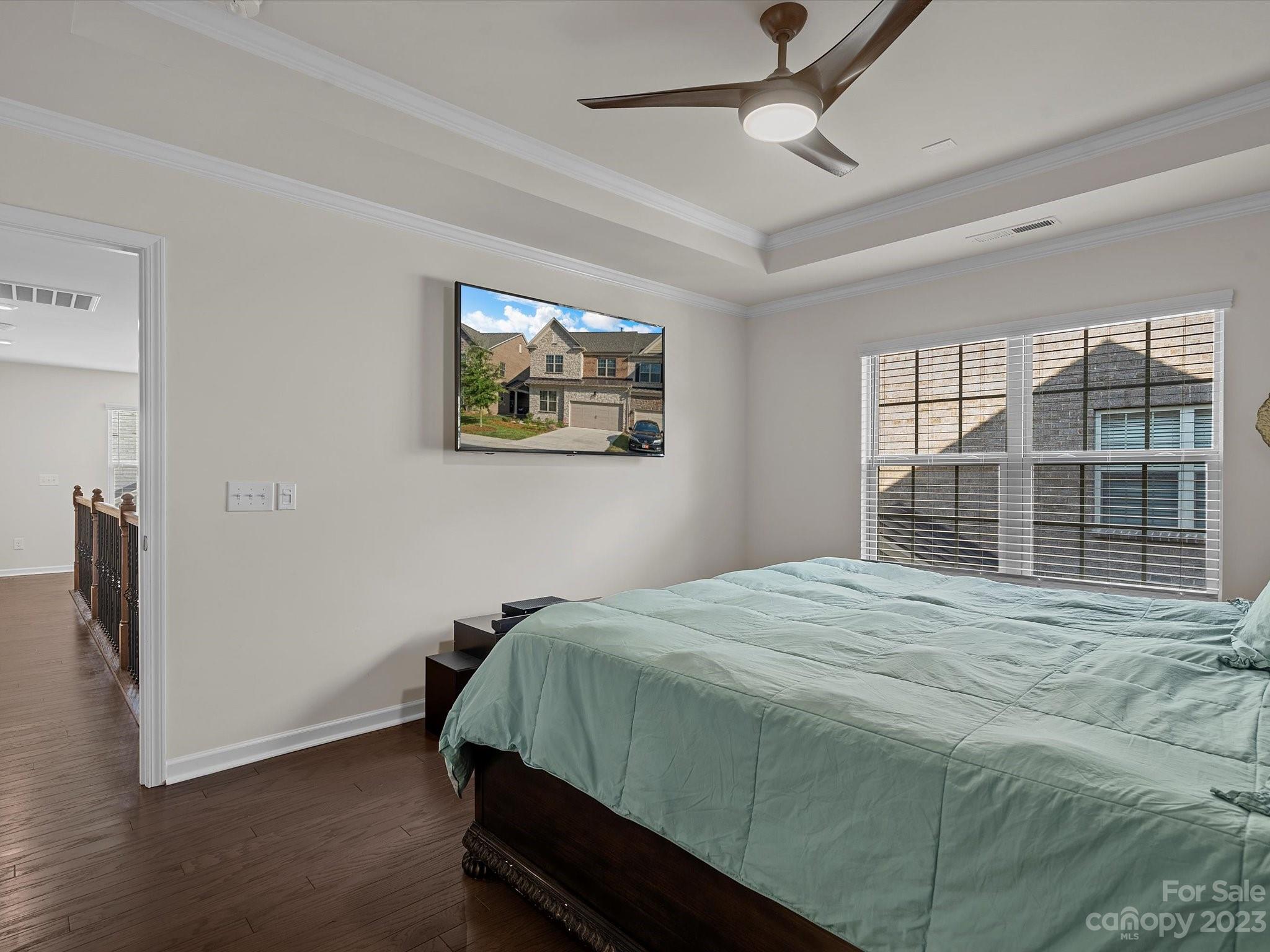 3071 Hartson Pointe Drive Indian Land, SC 29707 - Photo 24 of 48 a bedroom with a bed and a window