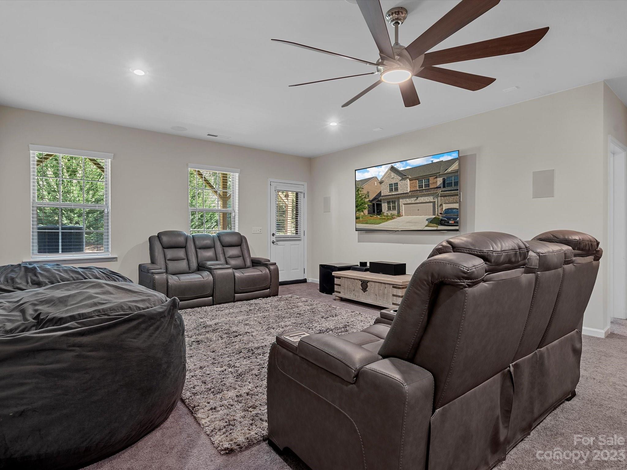 3071 Hartson Pointe Drive Indian Land, SC 29707 - Photo 41 of 48 a living room with furniture ceiling fan and a window