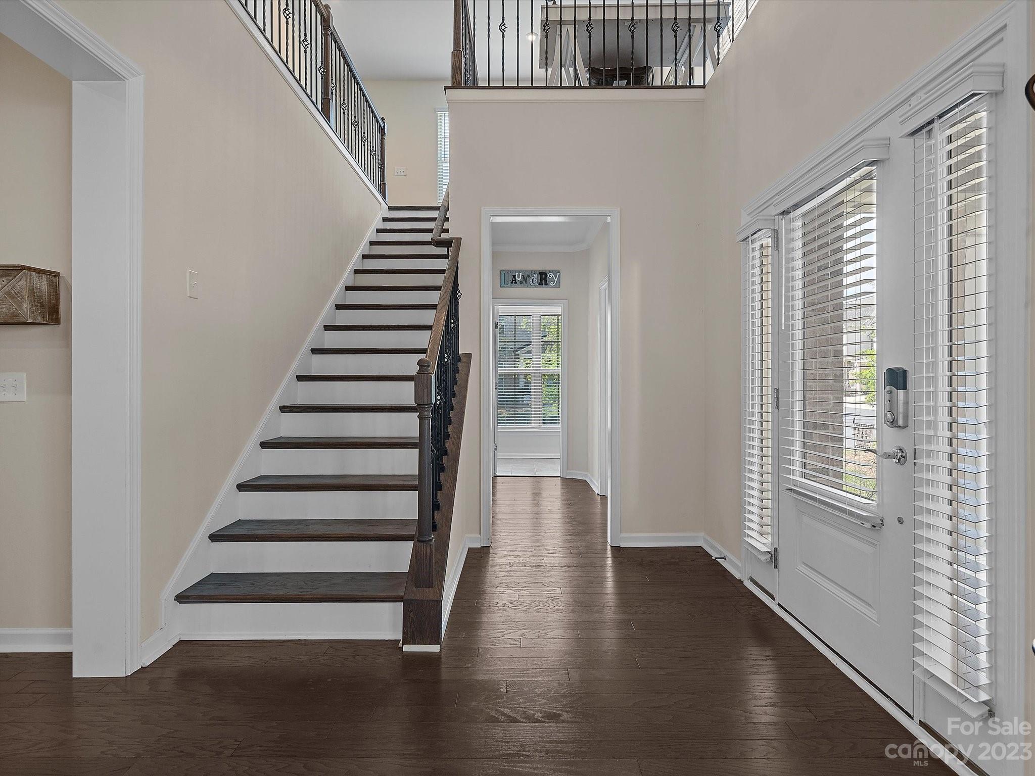 3071 Hartson Pointe Drive Indian Land, SC 29707 - Photo 5 of 48 a view of entryway with stairs and wooden floor