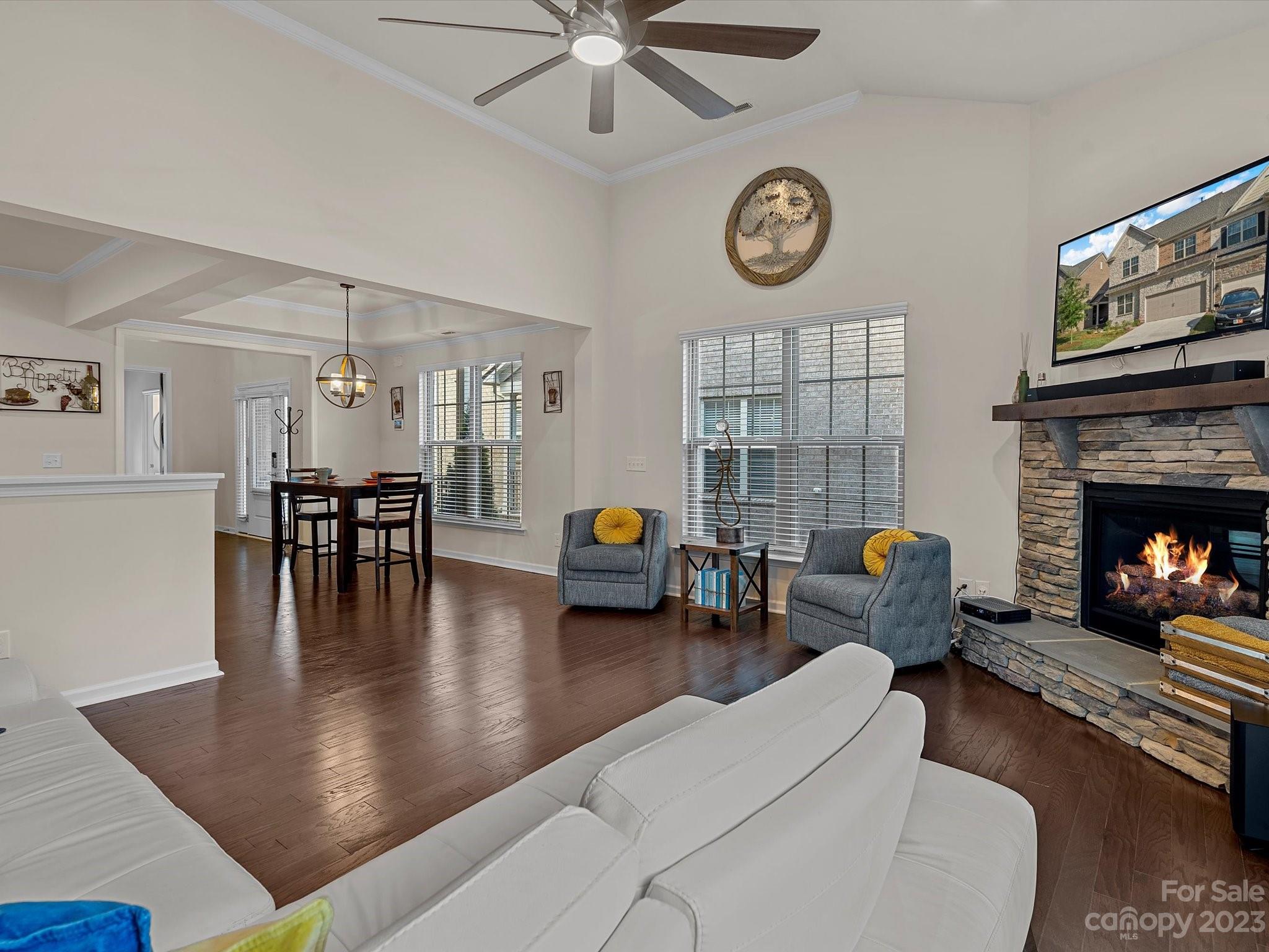 3071 Hartson Pointe Drive Indian Land, SC 29707 - Photo 6 of 48 a living room with furniture and a fireplace