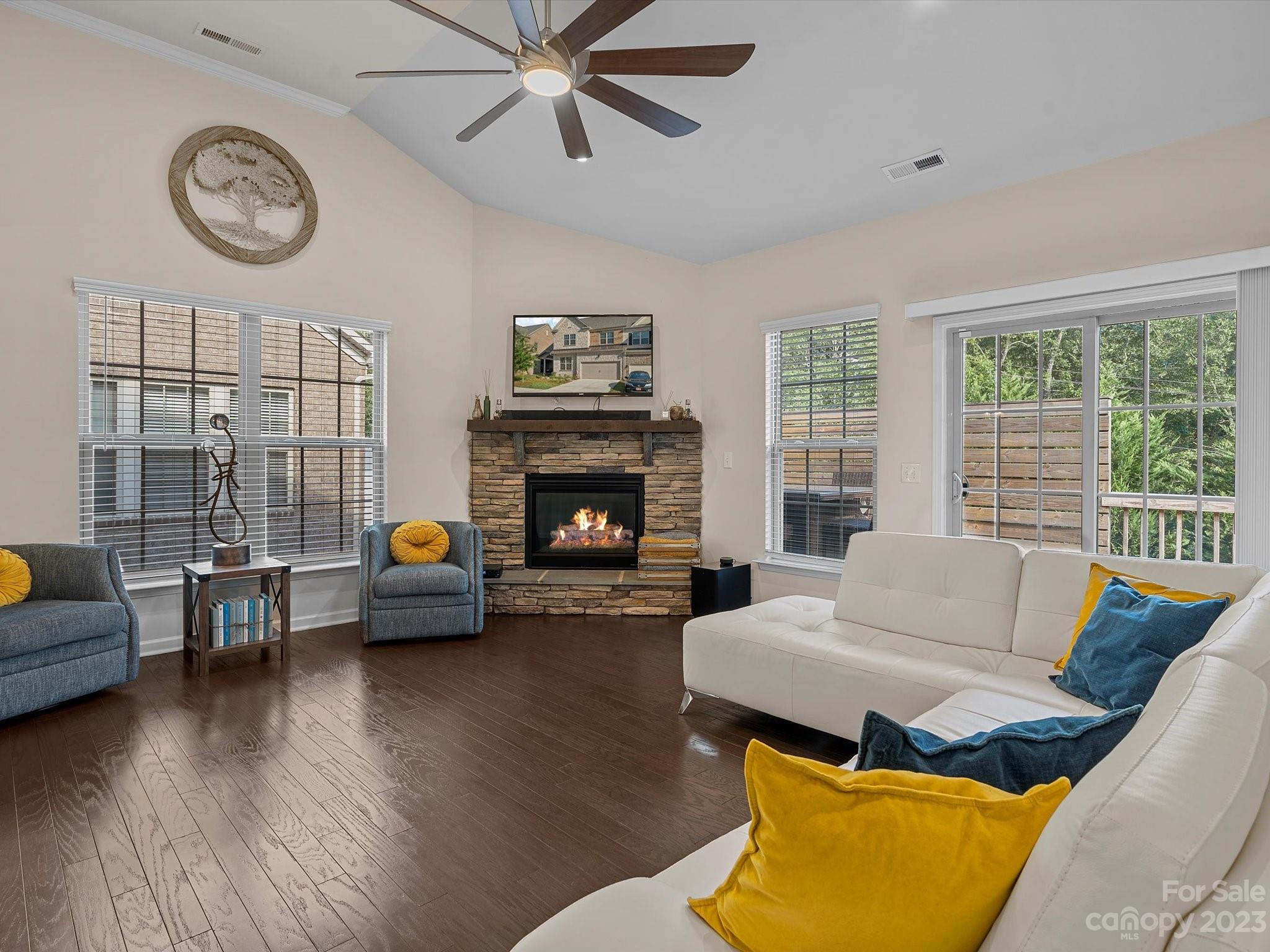 3071 Hartson Pointe Drive Indian Land, SC 29707 - Photo 7 of 48 a living room with furniture and a fireplace