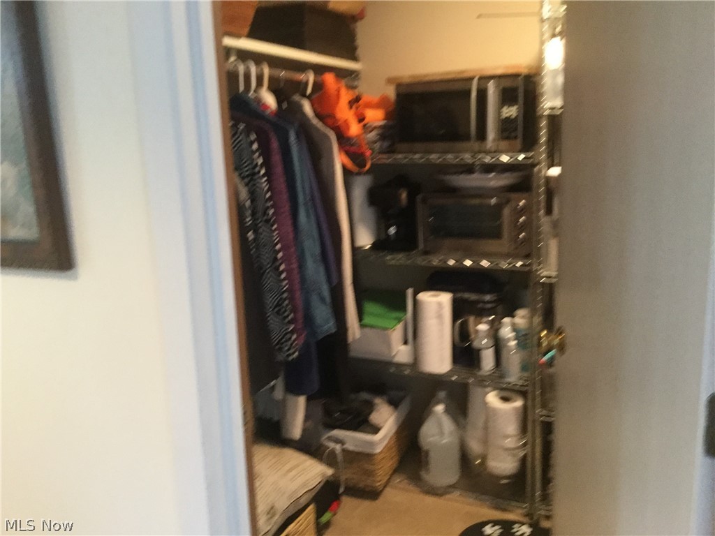 30069 Center Ridge Road, Unit D Westlake, OH 44145 - Photo 6 of 34 Large coat and storage closet off the foyer.