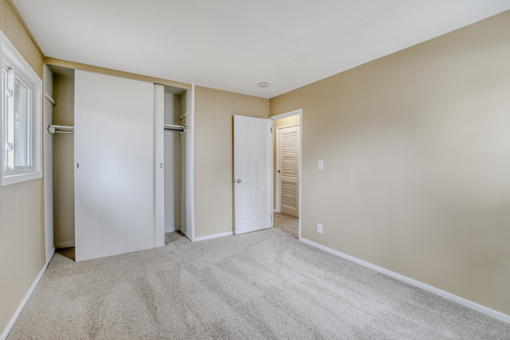 17 South Bartlett Road Streamwood, IL 60107 - Photo 11 of 16 a view of an empty room and window