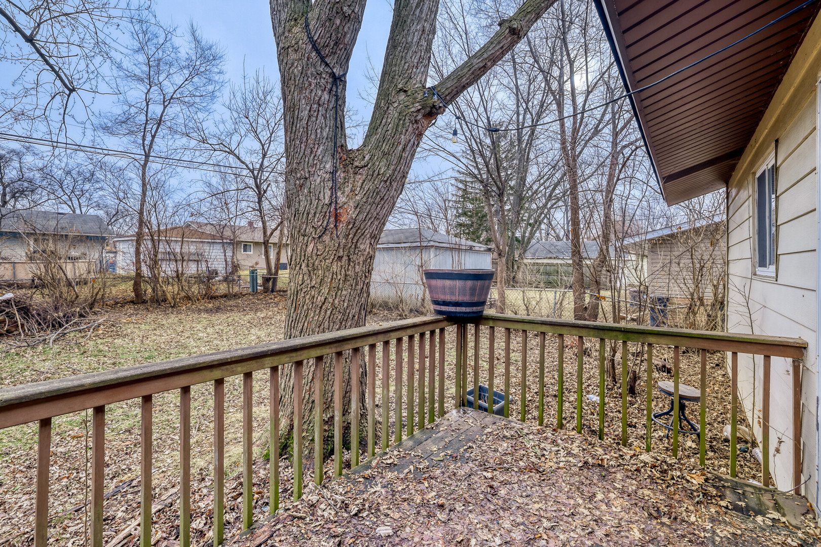 17 South Bartlett Road Streamwood, IL 60107 - Photo 13 of 16 a view of balcony with wooden floor and fence