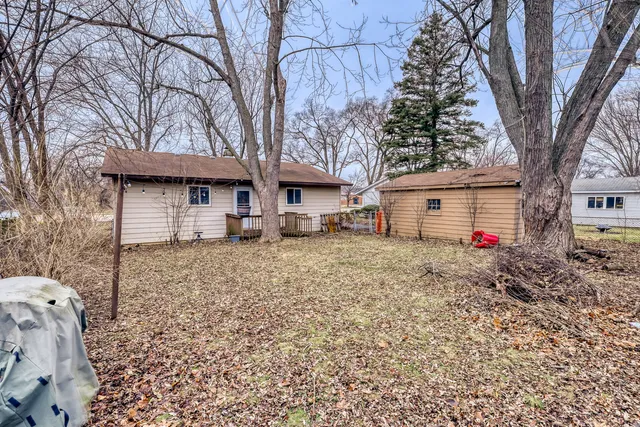 a house view with a backyard space