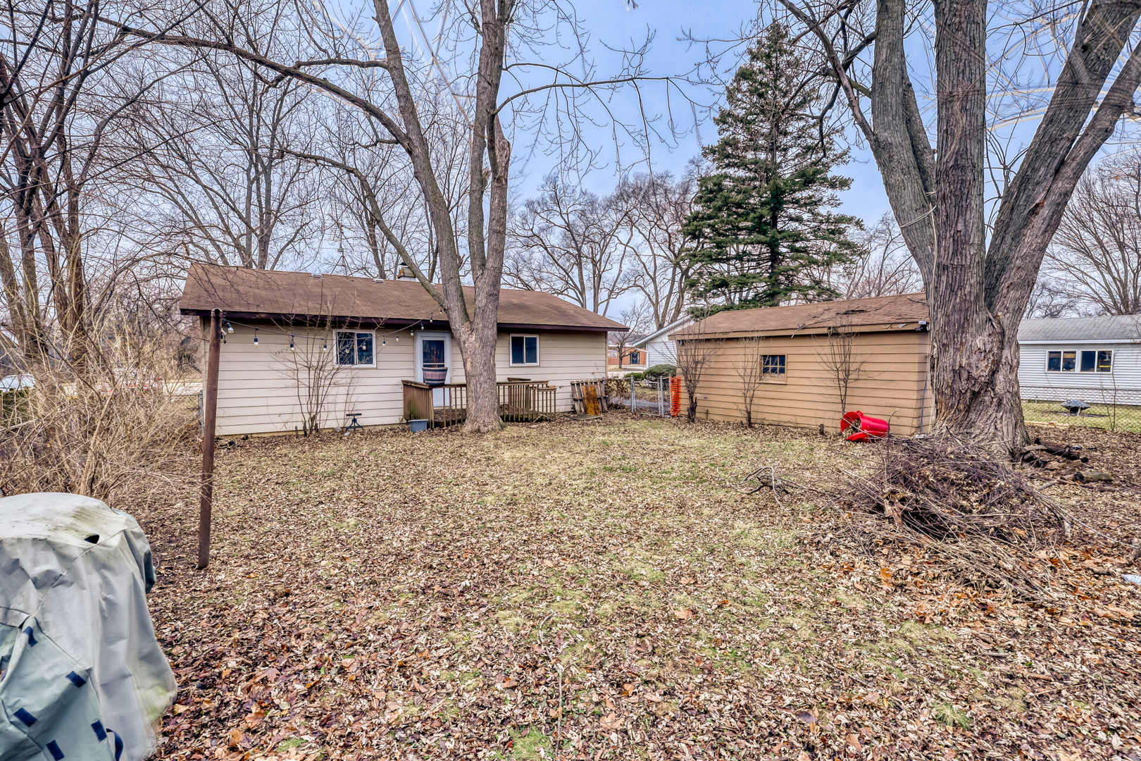 17 South Bartlett Road Streamwood, IL 60107 - Photo 14 of 16 a house view with a backyard space