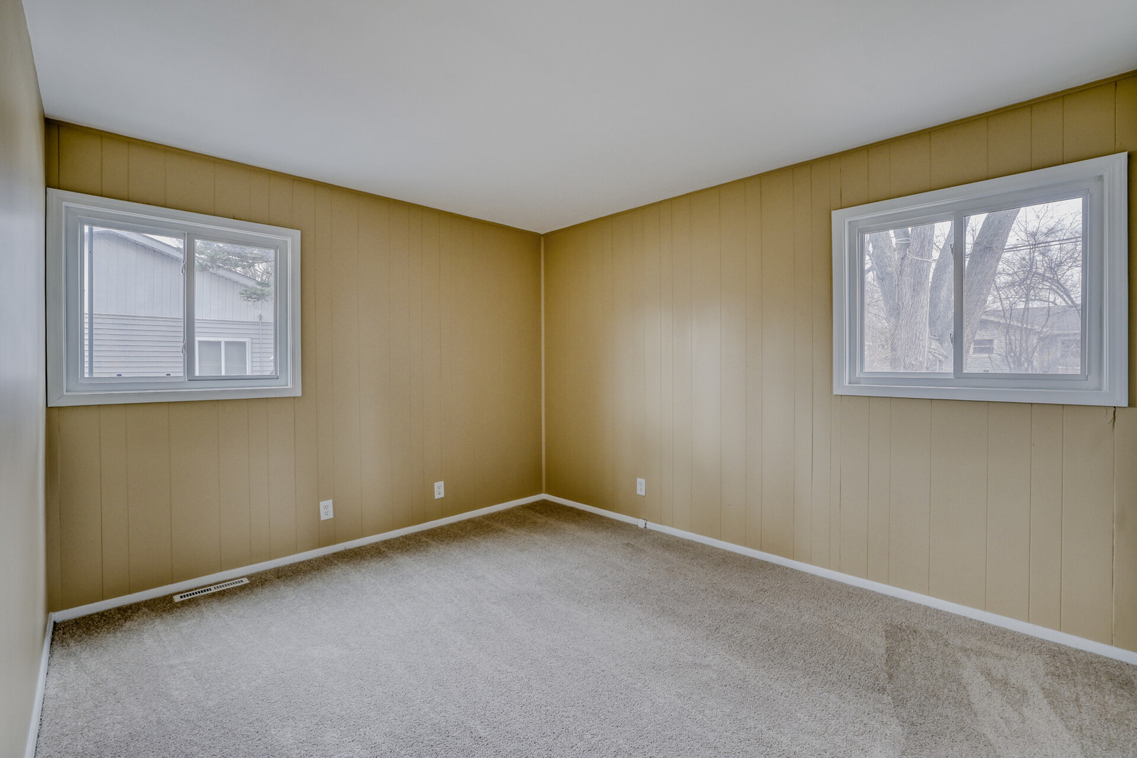 17 South Bartlett Road Streamwood, IL 60107 - Photo 10 of 16 a view of an empty room with a window