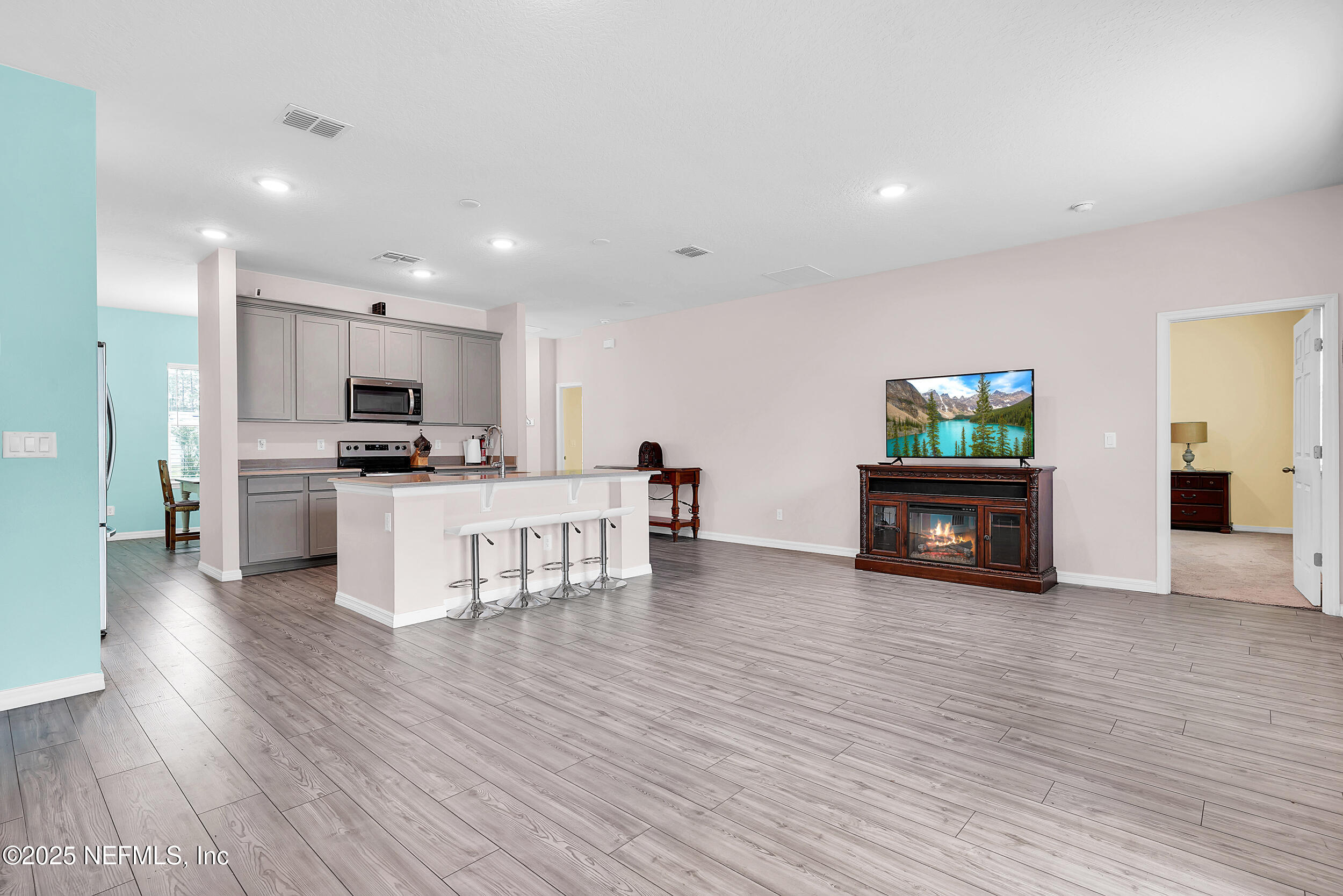 41 Seathorn Path Palm Coast, FL 32164 - Photo 17 of 48 a view of kitchen with microwave and cabinets