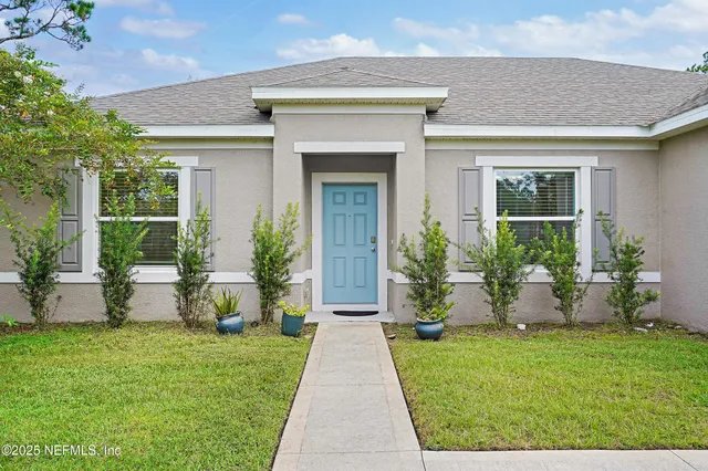 a front view of house with yard