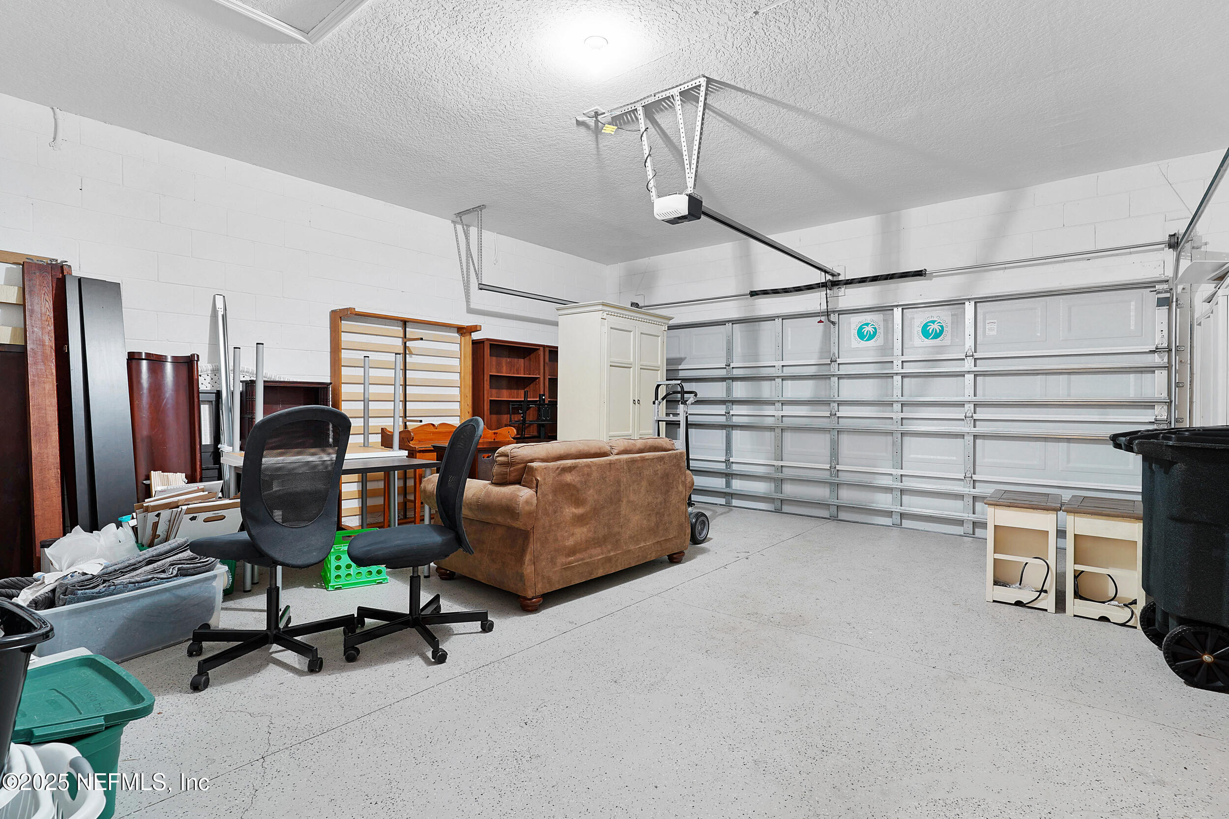 41 Seathorn Path Palm Coast, FL 32164 - Photo 31 of 48 a view of a workspace with furniture and a window