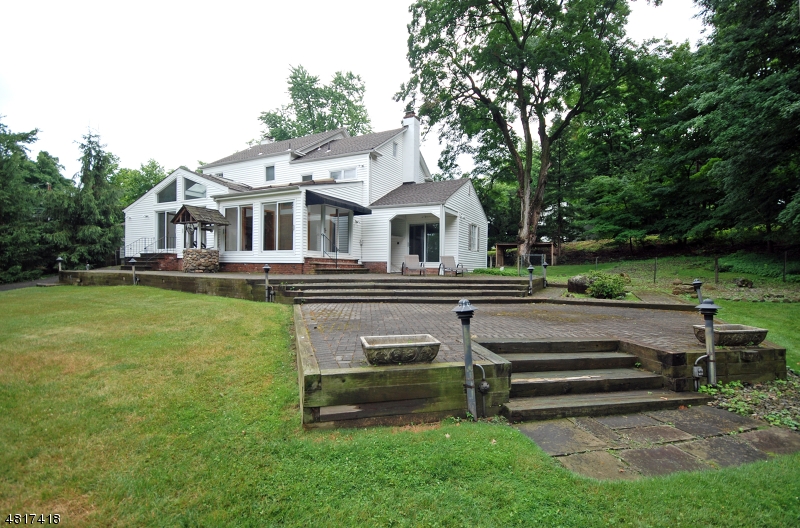 1 Old Mill Road Fairfield, NJ 07004 - Photo 14 of 14 a view of a house with a yard