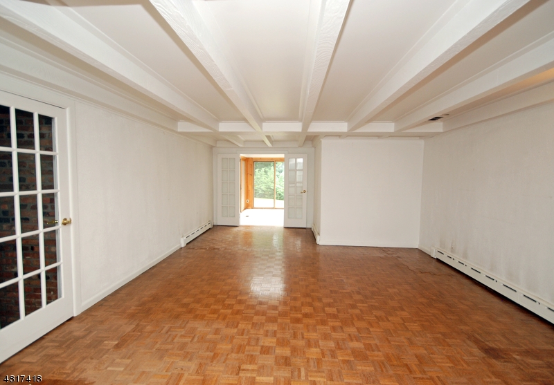 1 Old Mill Road Fairfield, NJ 07004 - Photo 6 of 14 an empty room with windows