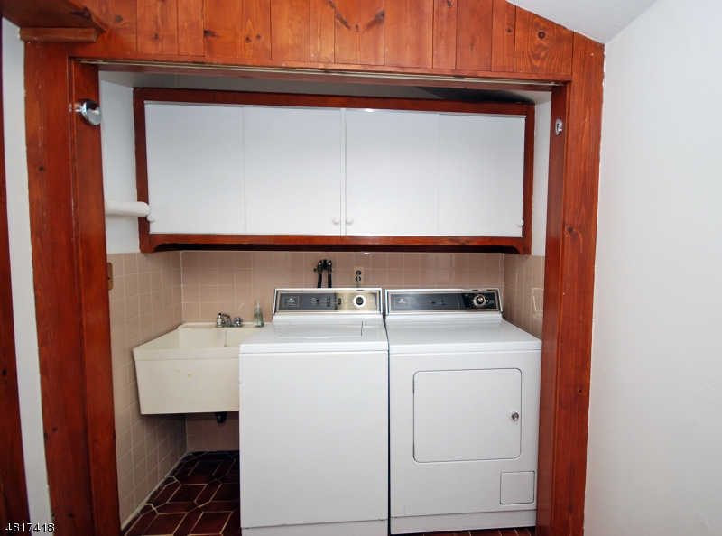 1 Old Mill Road Fairfield, NJ 07004 - Photo 9 of 14 a utility room with dryer and washer