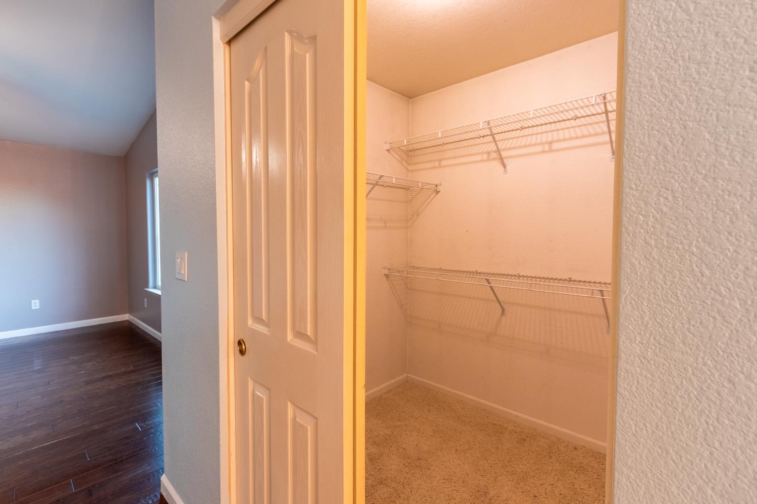 2024 Archer Circle Rocklin, CA 95765 - Photo 23 of 52 a bathroom with a glass shower door
