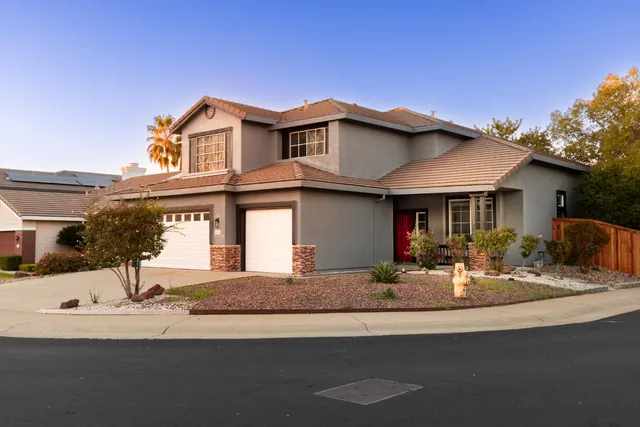 a view of a street with cars on both side