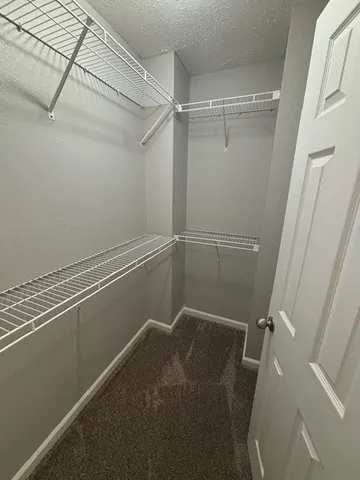 a view of a room with rack on the wall