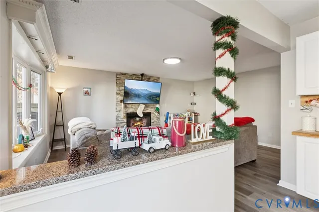 a view of living room with furniture and a flat screen tv