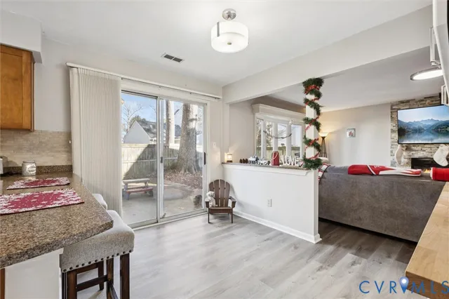 a spacious bedroom with a bed and a couch