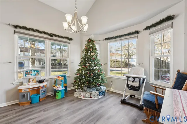 a bedroom with bed and a window