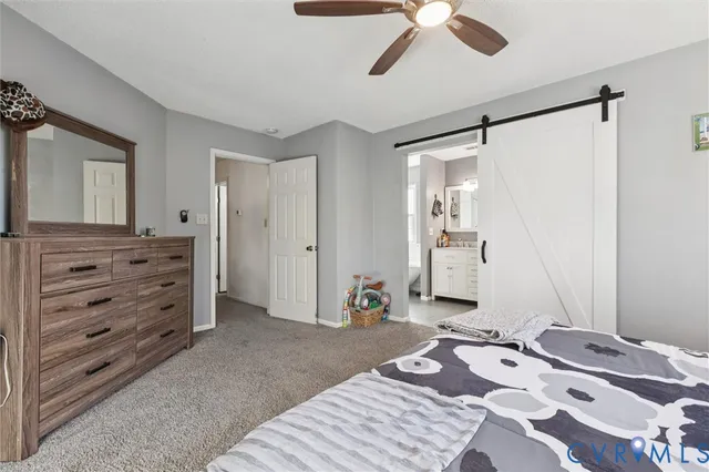 a bedroom with a bed and furniture