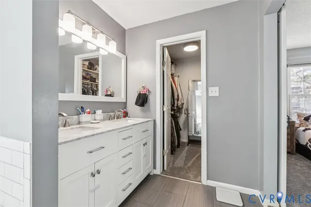 a bathroom with a sink and toilet