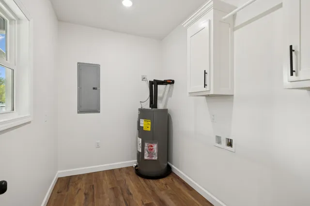 a white toilet sitting next to a bathroom sink