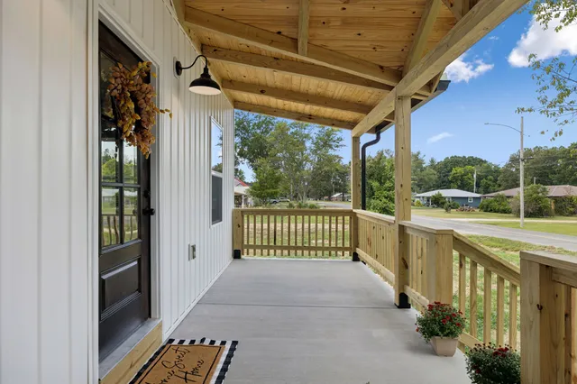 a view of balcony with furniture