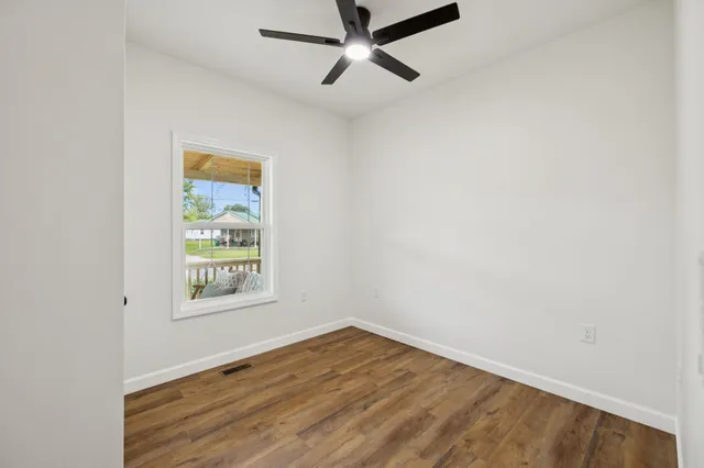 a house view with a backyard space