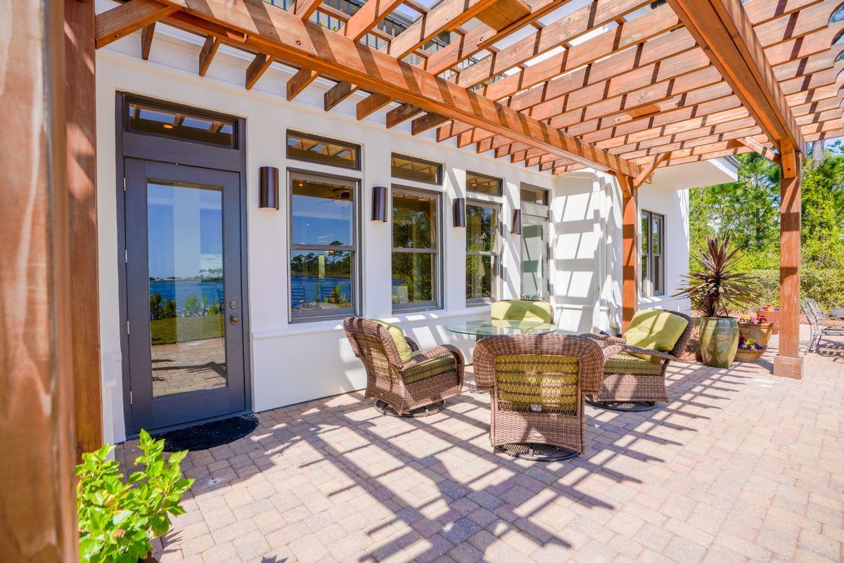 227 Wilderness Way Santa Rosa Beach, FL 32459 - Photo 26 of 45 a building outdoor space with patio furniture
