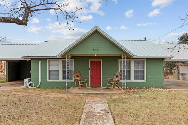 a view of a house with a patio