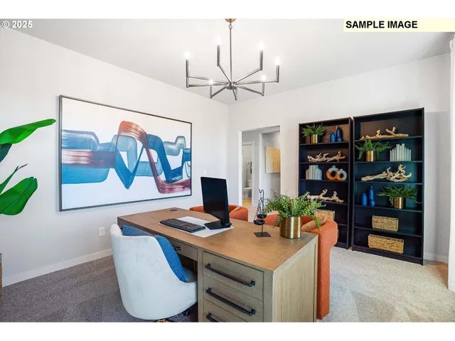 a view of a workspace with furniture