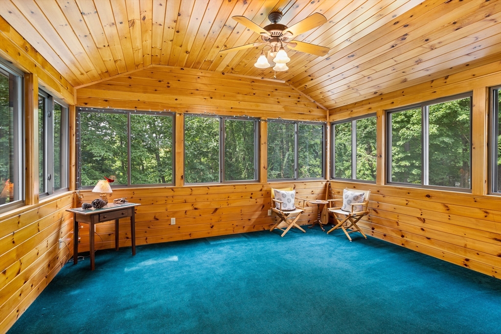 773 Great Road Stow, MA 01775 - Photo 11 of 37 a room with bed and large windows