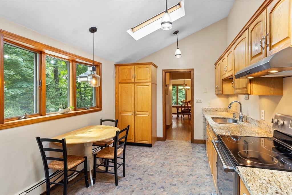 773 Great Road Stow, MA 01775 - Photo 15 of 37 a dining room with furniture and a window