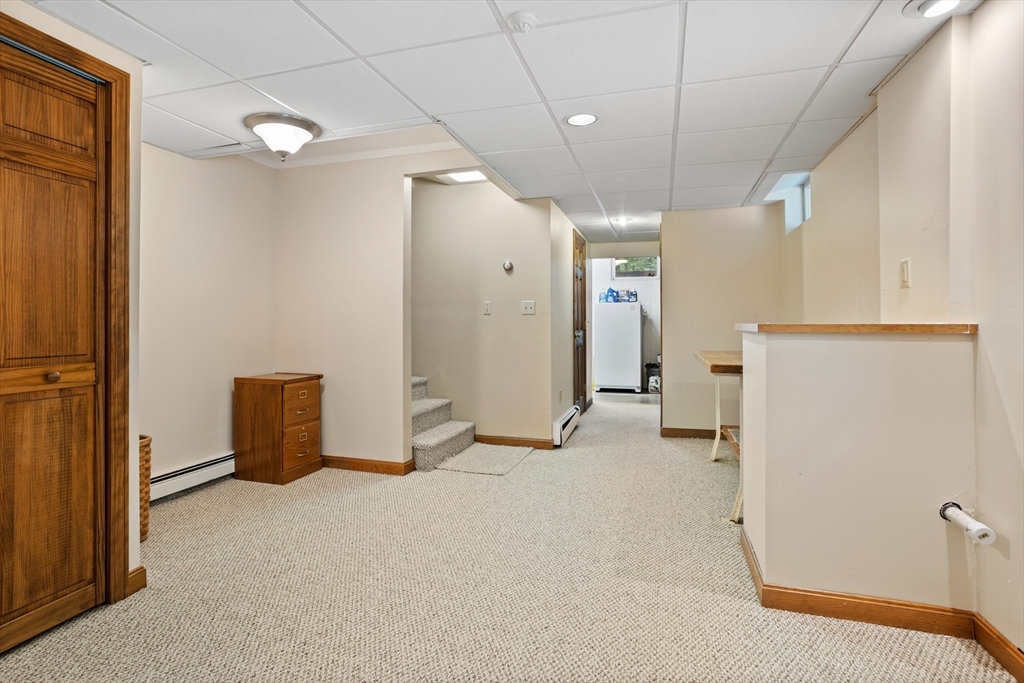 773 Great Road Stow, MA 01775 - Photo 26 of 37 a view of a storage & utility room with a sink